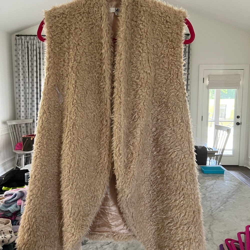 Long, Tan Vest
